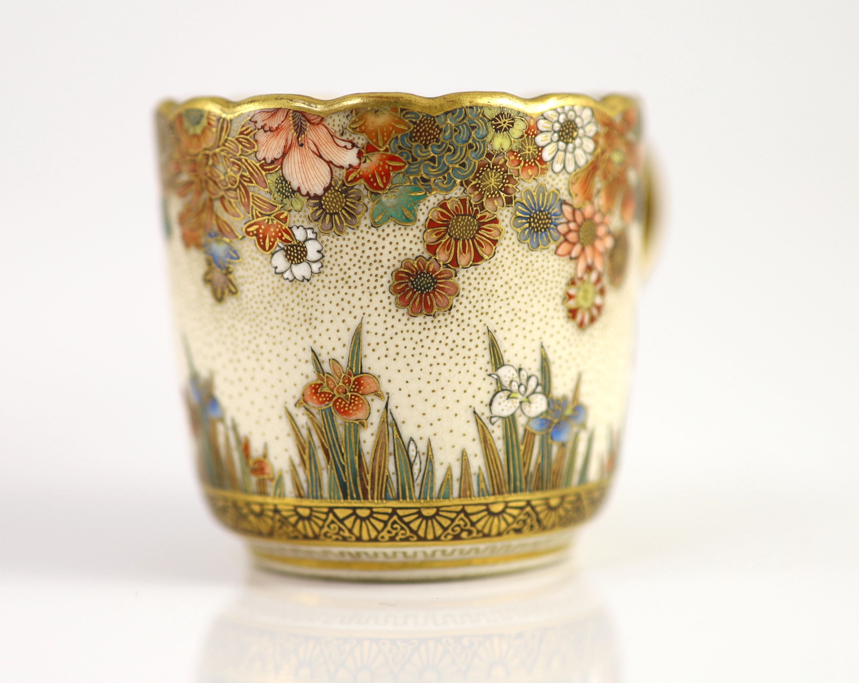 A Japanese Satsuma pottery cup and saucer, signed Seikozan, Meiji period, 11cm diameter